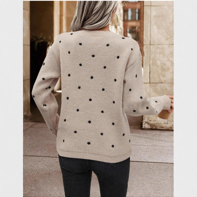 Fashionable polka dot print pullover sweater designed for a chic and casual look